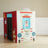 Children's playhouse with vintage ticket office design on a wooden floor.