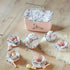 Plush tea set for toddlers with floral pattern, basket, teapot, cups and accessories