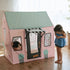 Kids play tent beauty salon with girl peeking through window opening