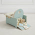 Wood frame includes convenient storage for the included toys in the back of the chair.