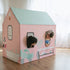 Pink kids play tent beauty salon with mint green roof, featuring window cutouts and illustrated salon details