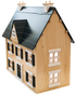 Wooden Dollhouse at an angle on white, showing its black scalloped roof, dormer window, chimneys and shuttered windows