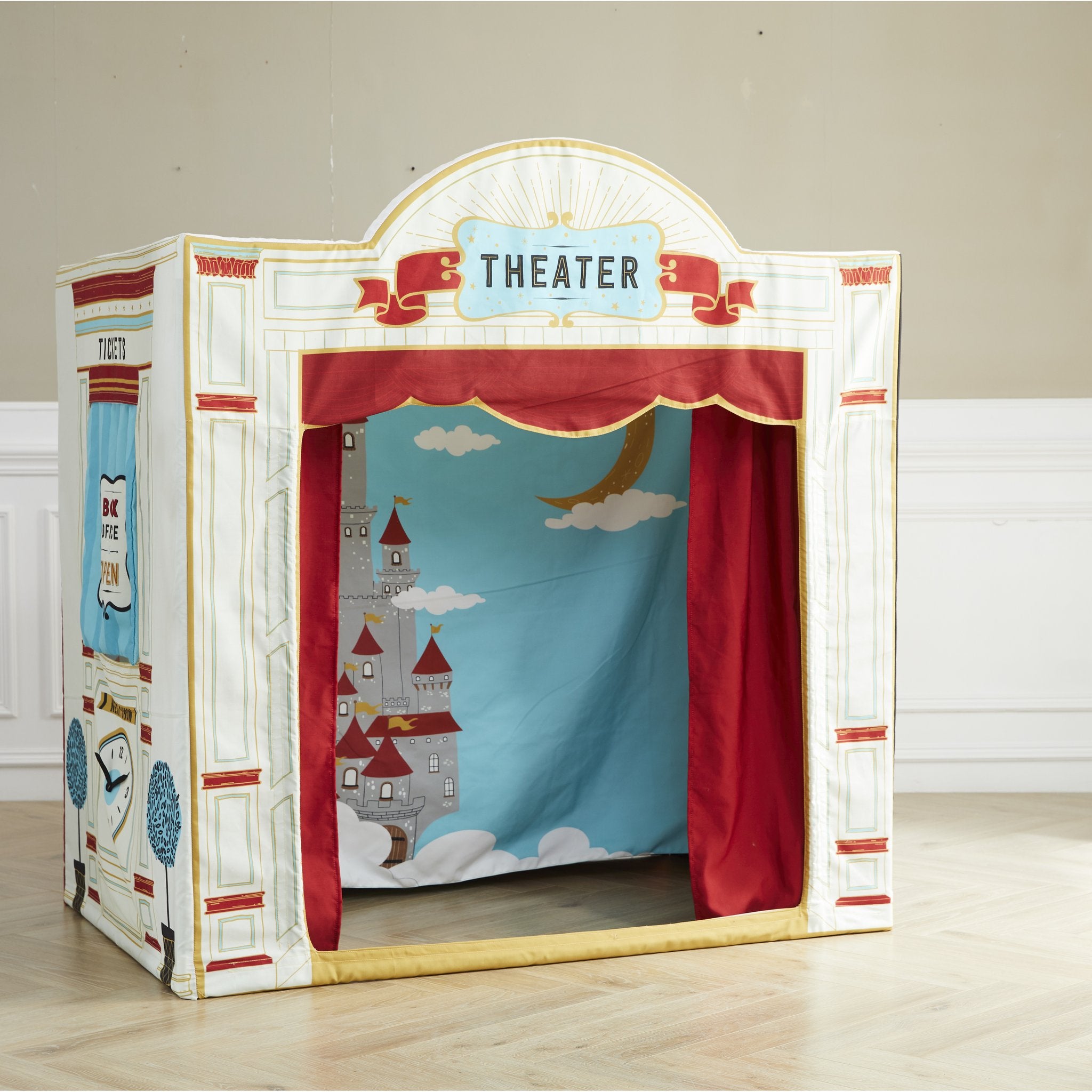 Play House Playhouse theater with red curtains open on the castle and moon backdrop
