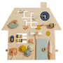 Wooden busy board in the shape of a house with interactive features like a clock, gears, and a door