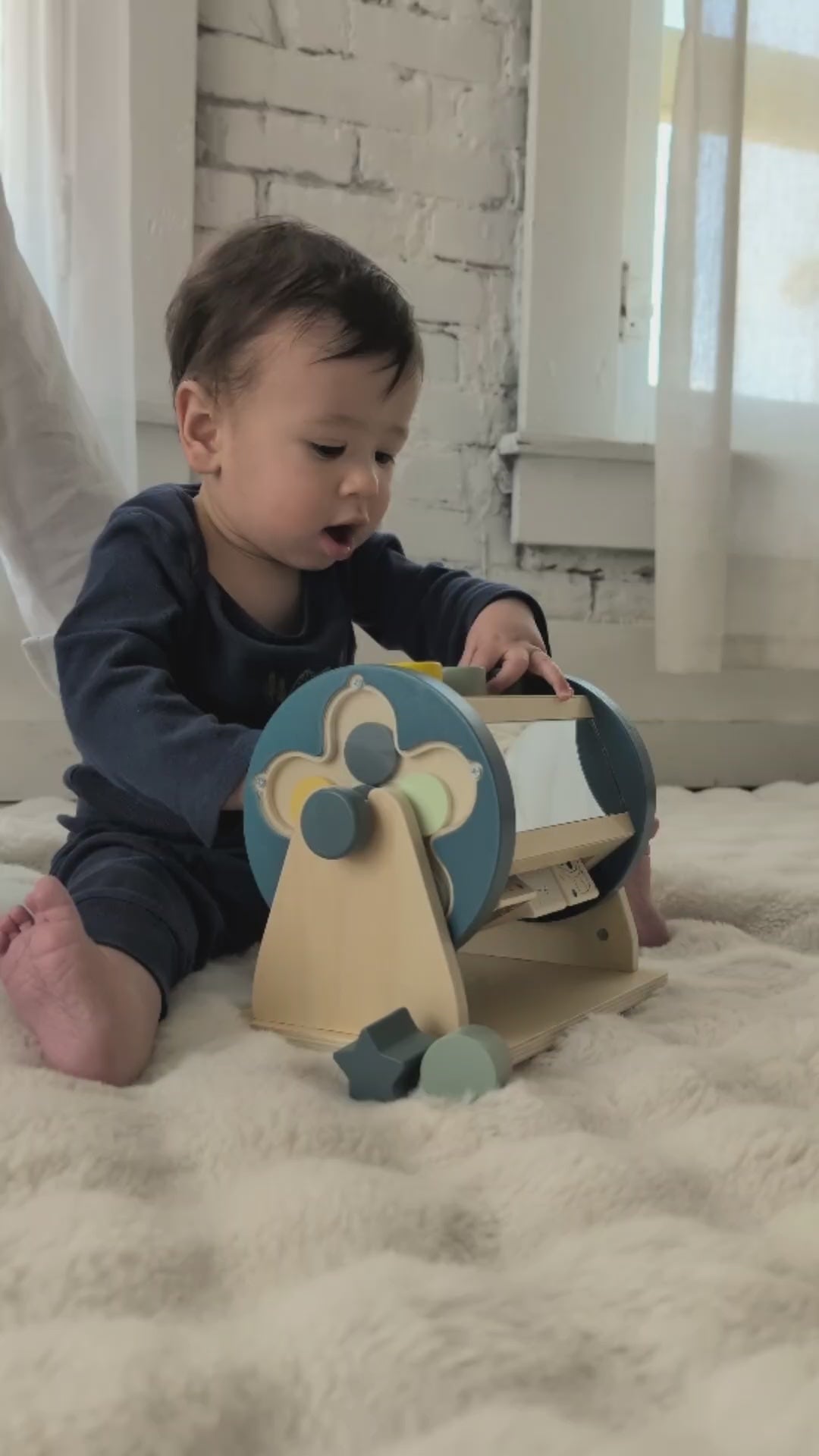 Baby playing with the Activity Roller