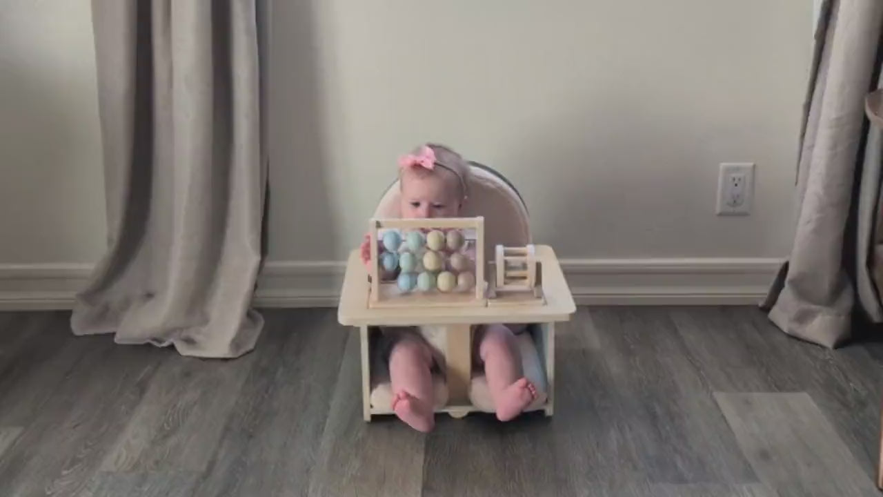 Baby playing with the Activity Roller